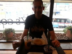 the husband about to get into his sandwich.